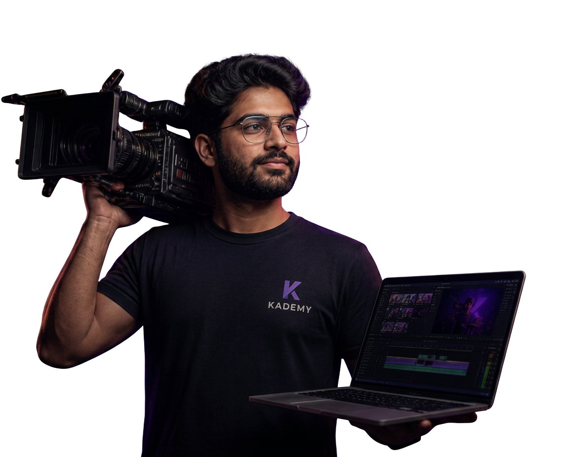 Kademy lead mentor with cinema camera and editing laptop